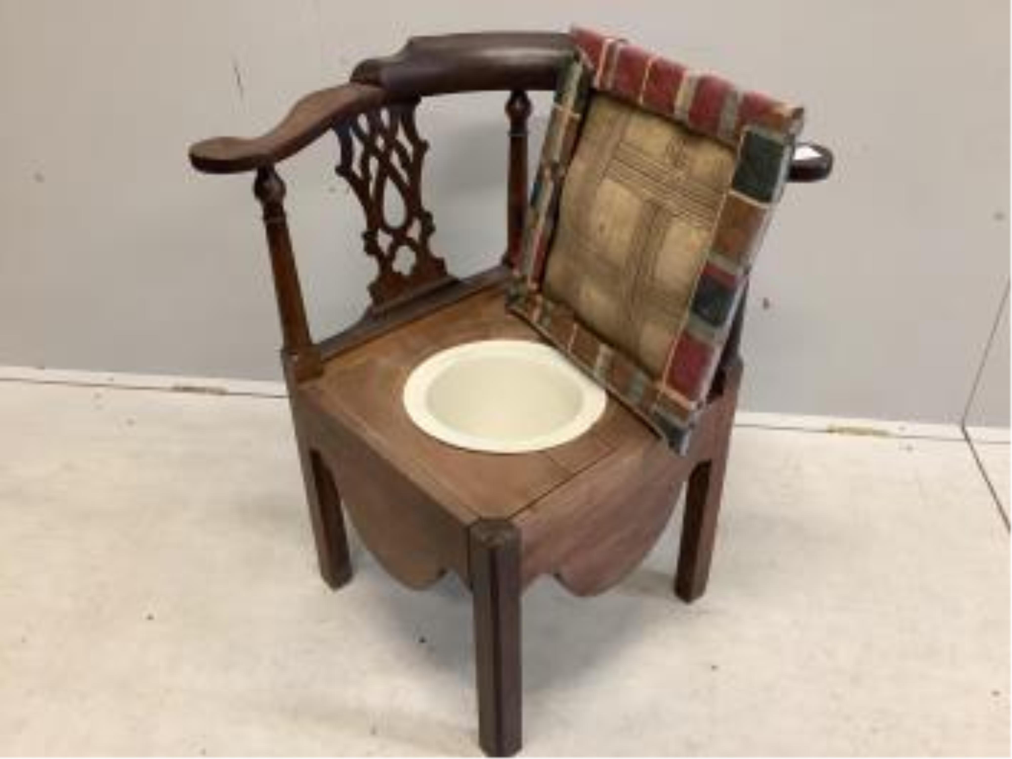 A George III mahogany corner commode chair, width 74cm, depth 64cm, height 80cm. Condition - fair, seat poor